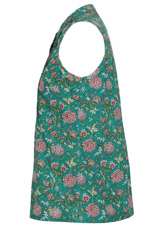 The side view of this jade green sleeveless blouse shows a floral print with red, pink and white flowers. It has a button-up collar, front pleats, and a fitted design that flares slightly at the hem.