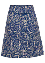 Blue cotton mid-length skirt with a wide piped waistband and beautiful pockets.