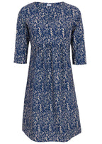 Front mannequin photo of 3/4 sleeve cotton dress with small gathers in front, empire waistline and pockets