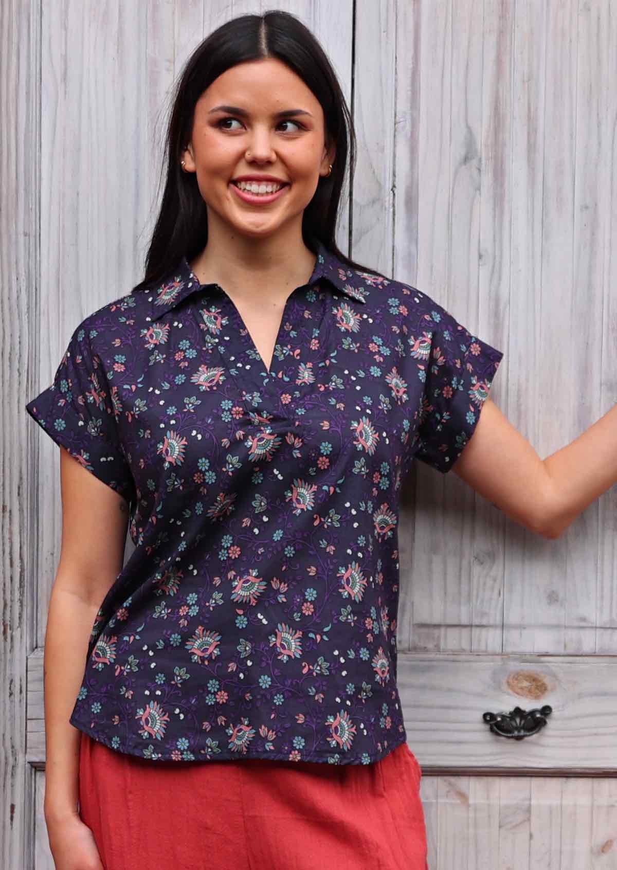 woman with dark hair in cotton blouse with shirt collar in Indian cotton