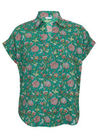 Front mannequin photo of cotton relaxed fit short sleeve top with V-neckline and collar