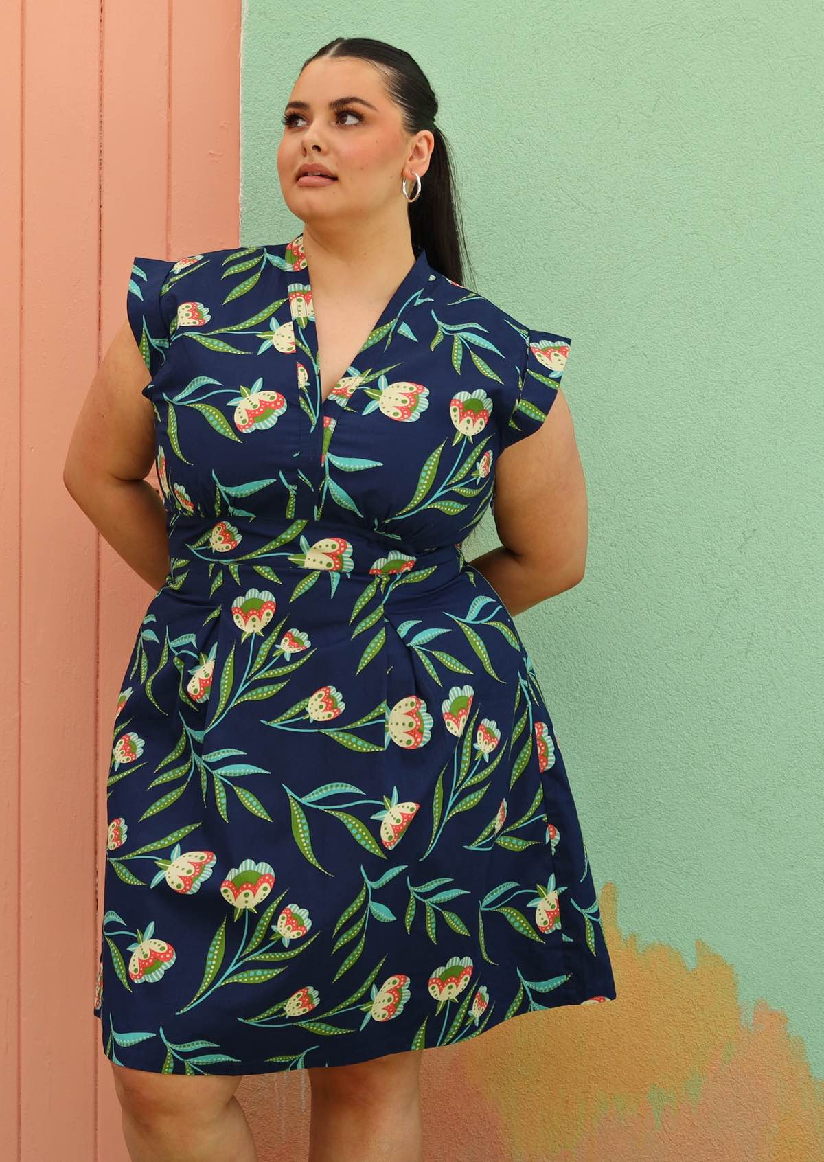 Plus sized Model wears navy retro cotton dress 