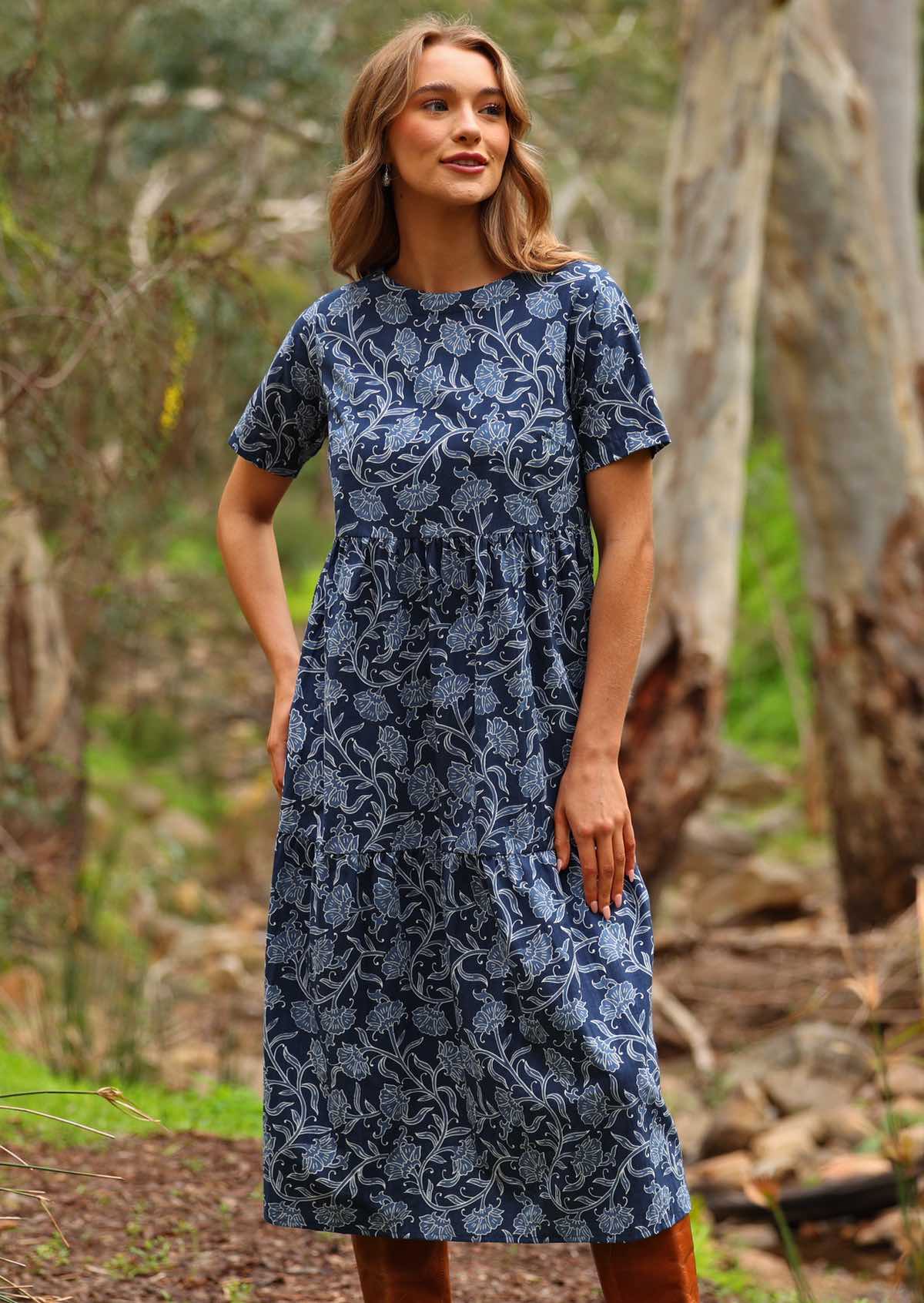 Model standing wearing Claudia Dress Neela navy blue 100 percent cotton maxi sundress