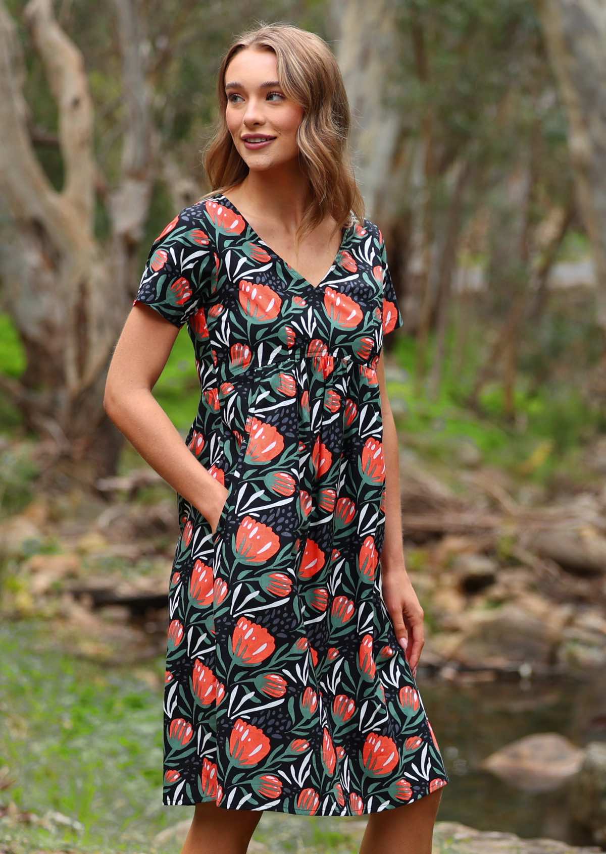 100% cotton botanical print with black base short sleeve dress with pockets