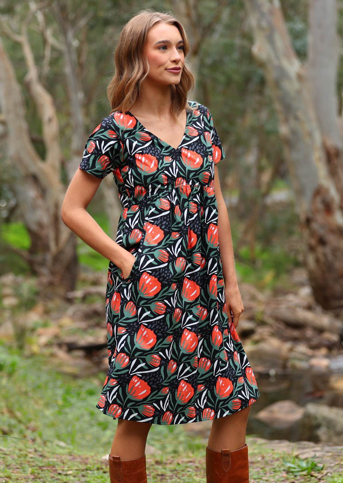 Over the knee length cotton dress with empire waistline and short sleeves is stylish comfort