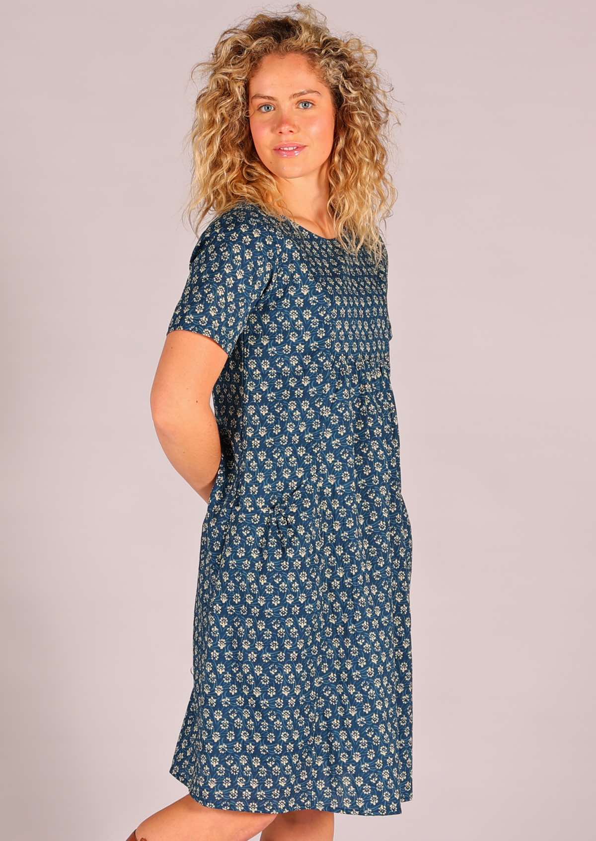 Short sleeve cotton dress with high round neckline and square yoke