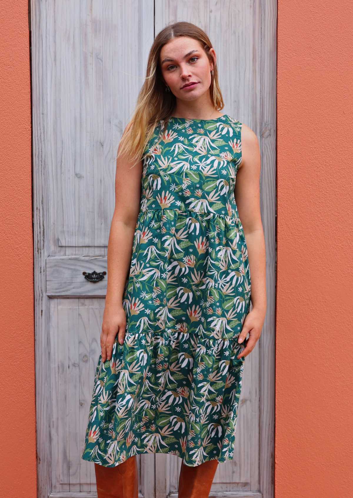 Model standing in front of door wearing Harper dress Flannel Flower 100 percent cotton sleeveless dress