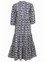 Mannequin front of dress. 