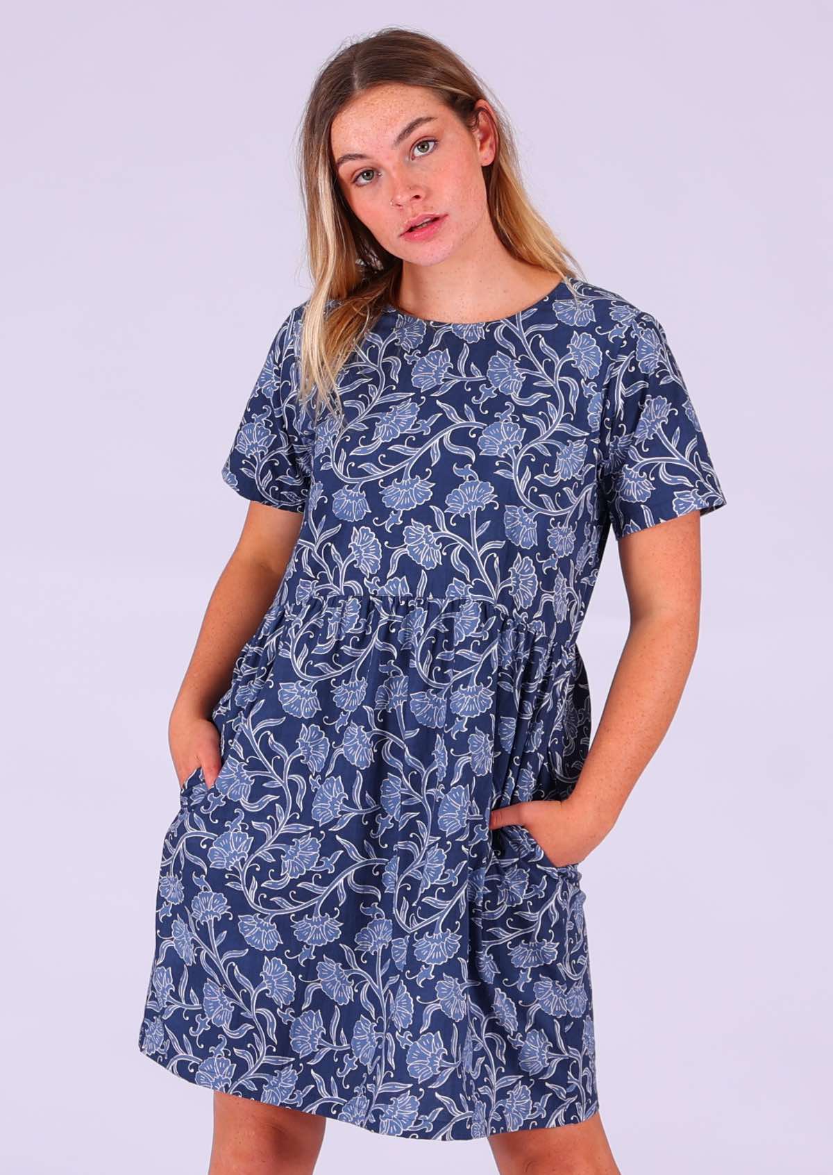 Model wearing Mabel Dress Neela with hands in pockets