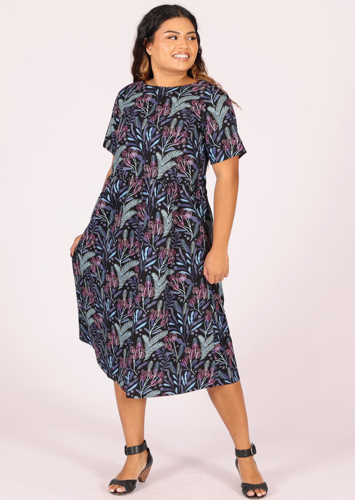 100% cotton shin length dress with short sleeves and high round neckline