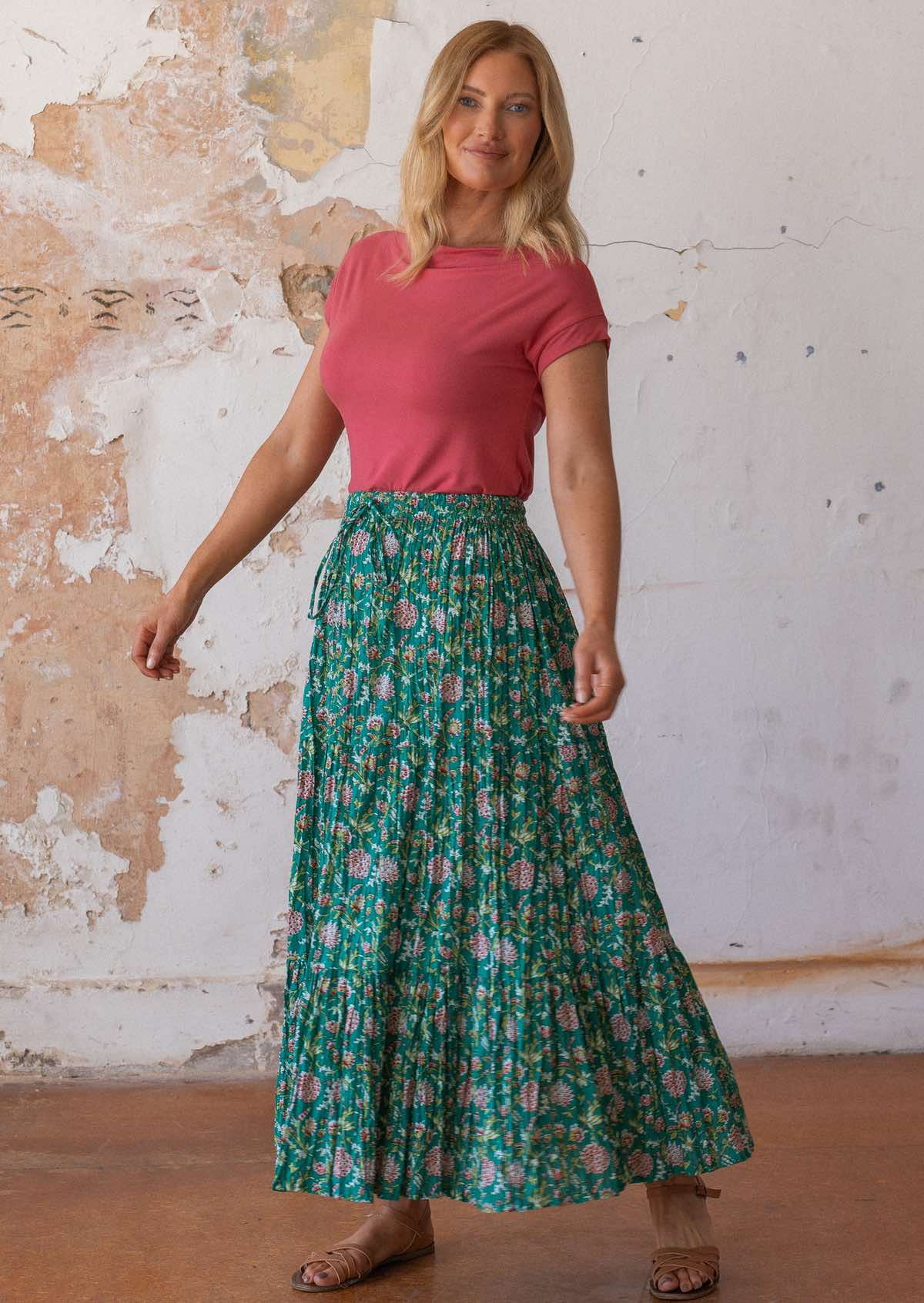 Model wearing three tiered 100 percent cotton maxi skirt with elasticated waistband and drawstring