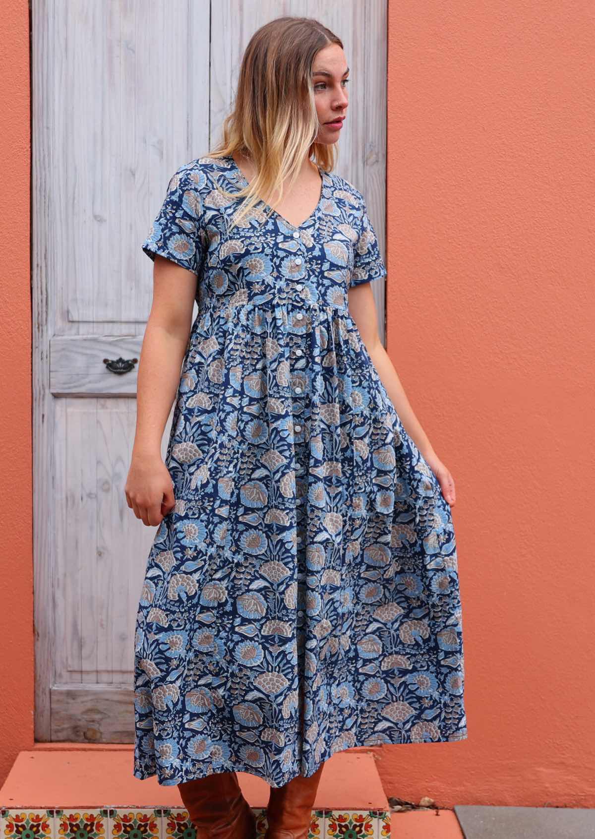 Short sleeve V-neck empire waistline loose fit lightweight cotton dress in beautiful blue floral print