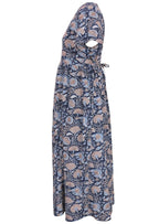 Shin length lightweight cotton dress with short sleeves and shoestring ties to cinch in