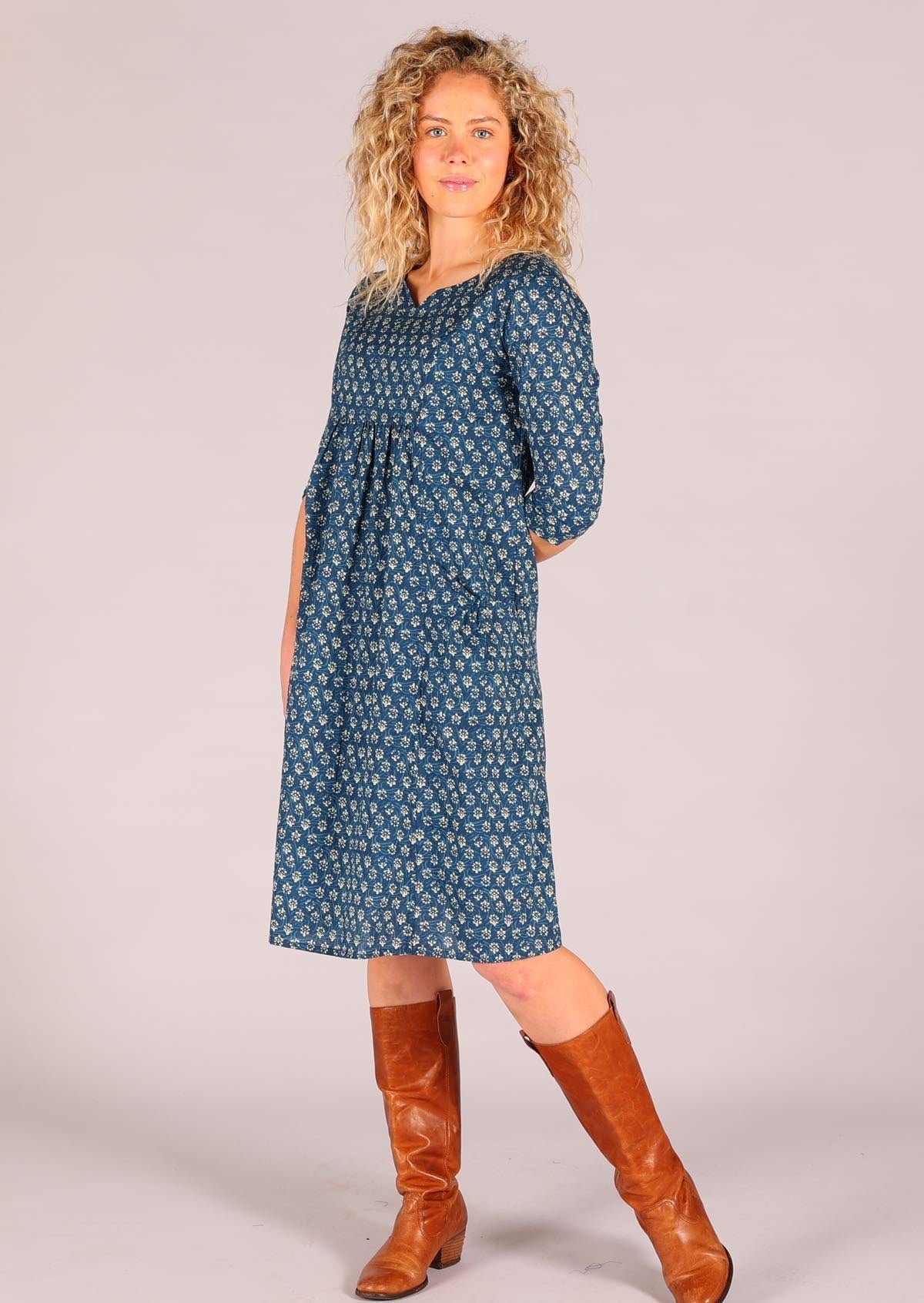 100% cotton relaxed fit dress with 3/4 sleeves and gathers under the bust