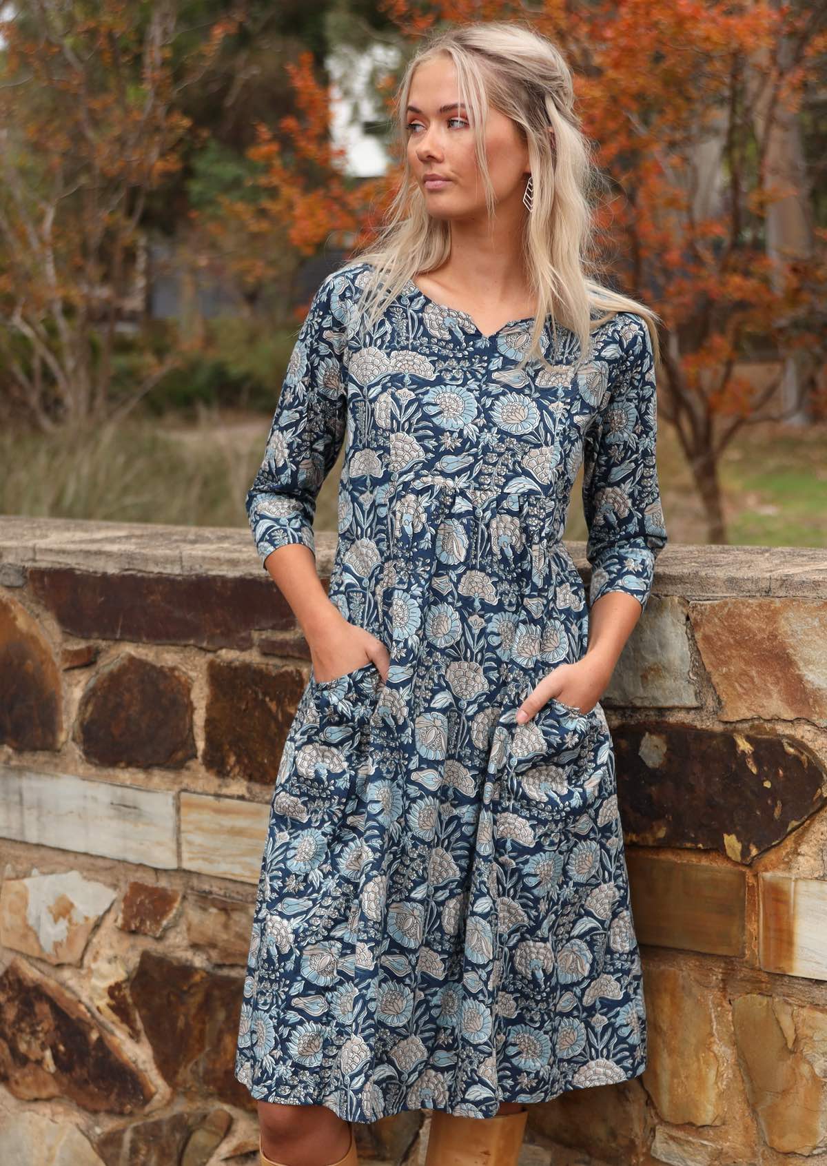 Lightweight cotton dress with empire waistline, sits over the knee