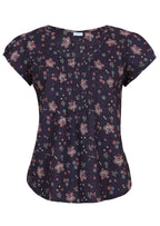 Front mannequin photo of cotton cap sleeve top with floral print ton dark base and small pleats across bodice