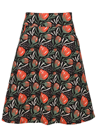 A-line cotton skirt with stylised native floral print on black base
