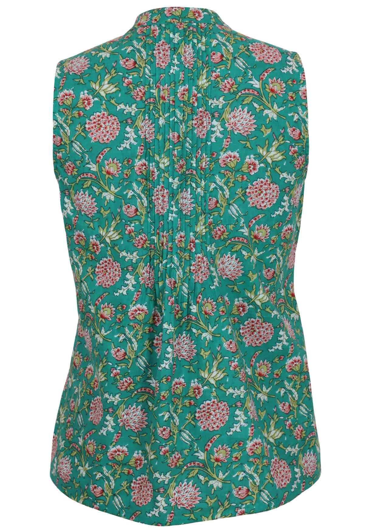 The back view of this jade green sleeveless blouse features a floral print and vertical pleats in smooth cotton.